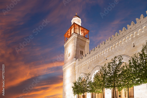 King Hussein Bin Talal mosque in Amman (at night), Jordan.  Against the background of a beautiful sky with clouds photo