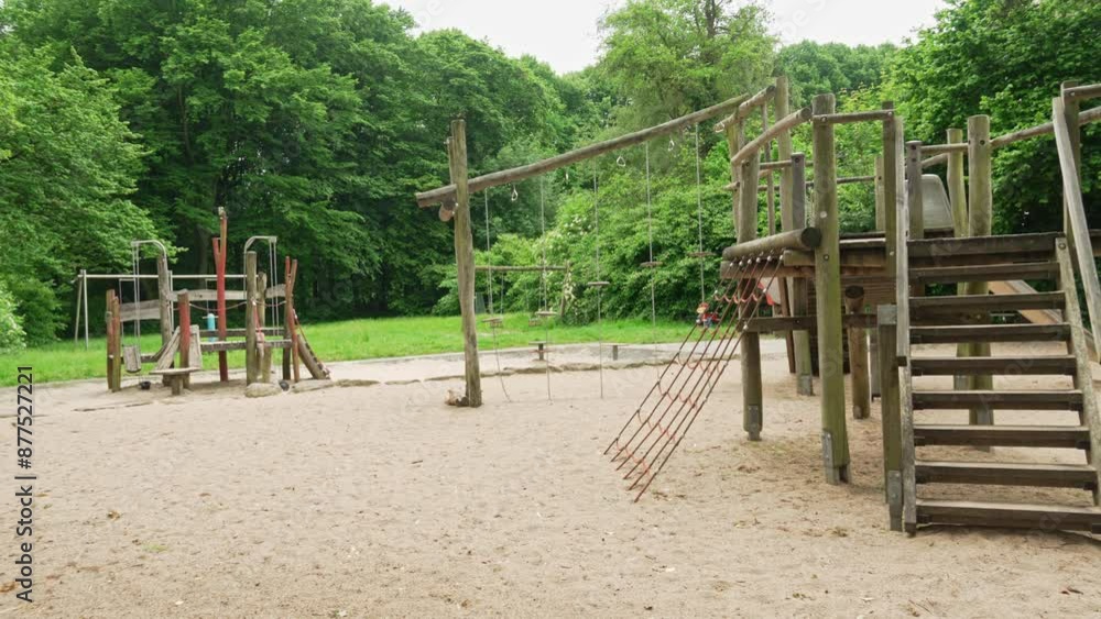 Public children playground made of natural materials. Kindergarten and playground for children. Children entertainment Public children playground made of natural materials. Kindergarten and playground for children. Children entertainment