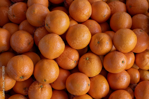 Closeup of oranges at the market.