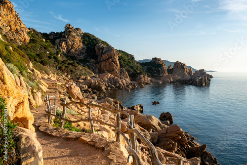 Costa Paradiso path to Li Cossi beach on the coast with turquoise water in Sardinia, Italy