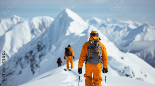 Wallpaper Mural Three individuals in orange gear descend a snowy Alaskan mountain on skis and snowboards Torontodigital.ca