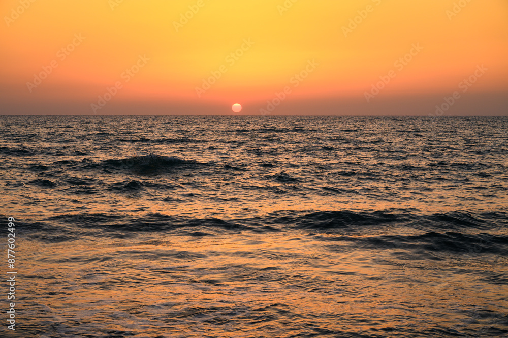 Panoramic view from the shore of the Mediterranean Sea at sunset Panoramic view from the shore of the Mediterranean Sea at sunset