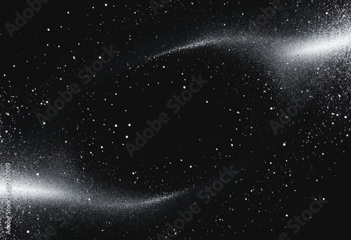 Alpha particles create a mystical and beautiful swirling pattern in the dark night sky with a powdery blizzard of shimmering silver and black organic particles
