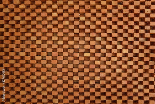 Foto The pattern of brown bricks is arranged in alternating order