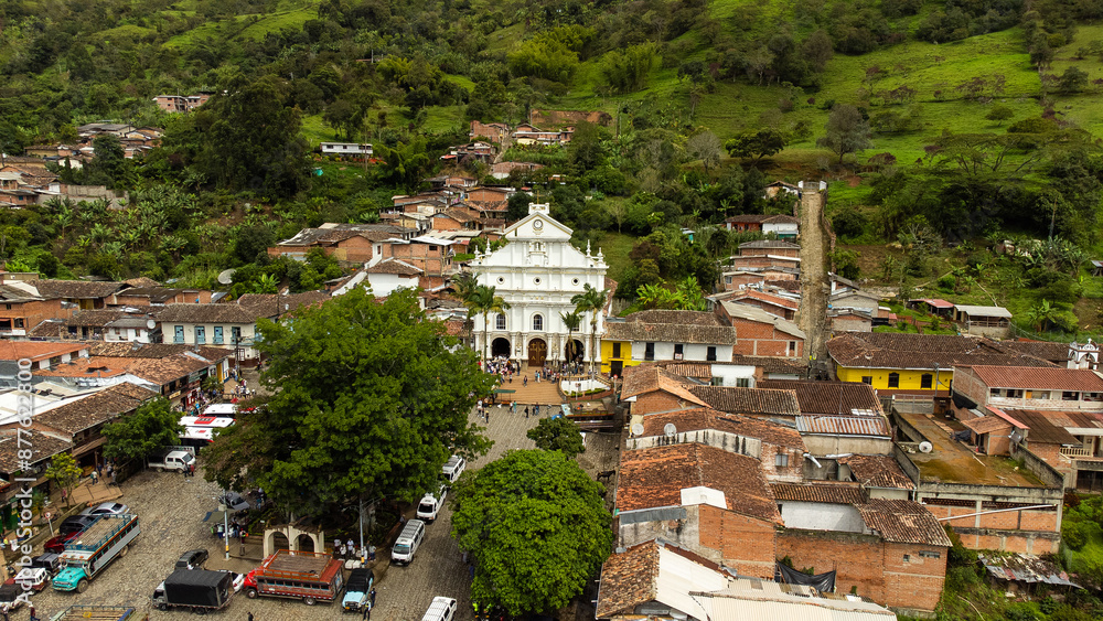 Fototapeta premium Angostura, Antioquia. Colombia - June 23, 2024. Aerial panorama made with a drone of the municipality of Angostura.