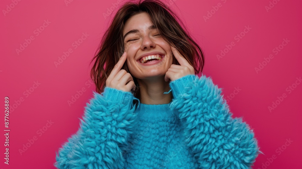 The happy woman in blue sweater The happy woman in blue sweater
