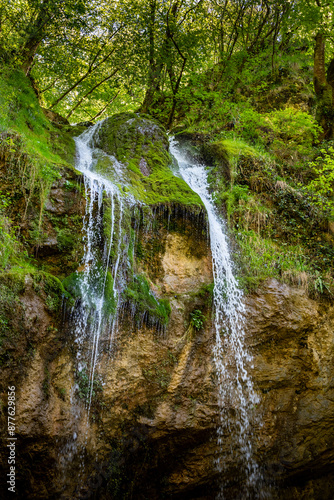 Brisalo waterfall in the Slapnica canyon ,hidden hiking attraction in the dense forest, located in the wonderful Zumberak mountain area in the continental Croatia photo