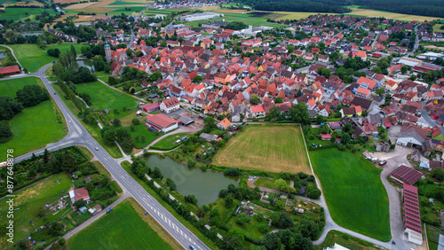 Aerial view of the old town of Markt Erlbach  in Germany, on a cloudy day in late spring. photo