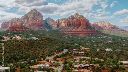 Desert and mountain range overlooking houses in the town of Sedona, Arizona, United States.