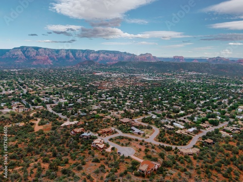 Desert and mountain range overlooking houses in the town of Sedona, Arizona, United States. photo