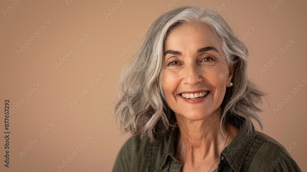 The elderly smiling woman The elderly smiling woman