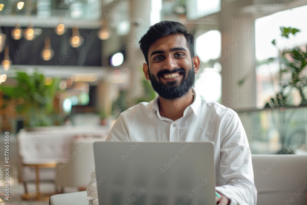 A person working on a laptop computer, potentially doing work or research A person working on a laptop computer, potentially doing work or research