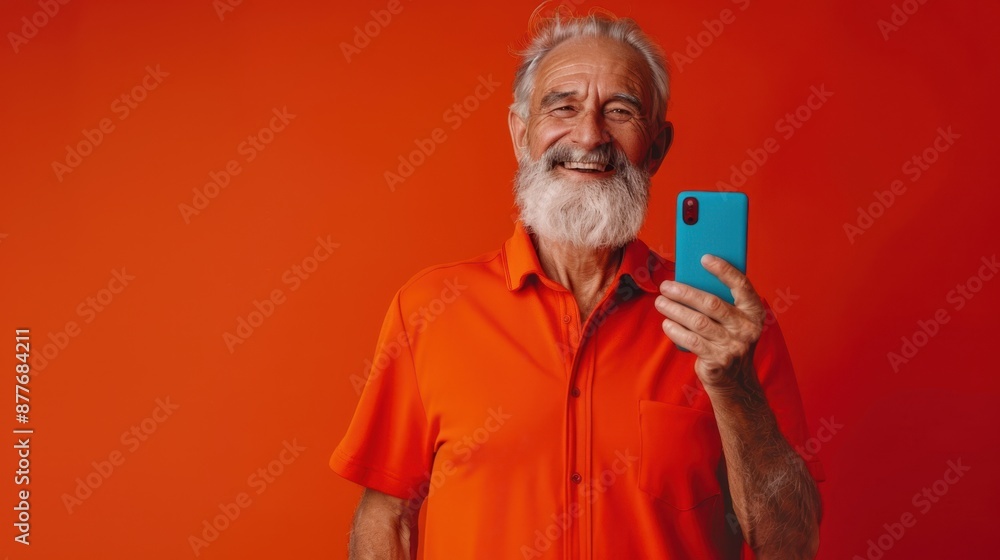 The elderly man with smartphone The elderly man with smartphone