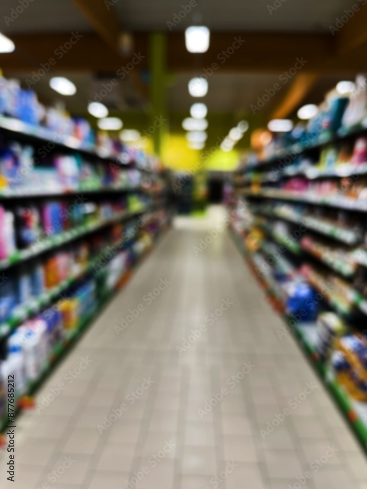 Fototapeta premium Blurry Supermarket Aisle Background Image