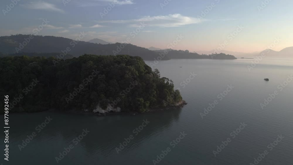 Tropical island with rainforest, ocean at sunrise. Wonderful aerial view drone Tropical island with rainforest, ocean at sunrise. Wonderful aerial view drone