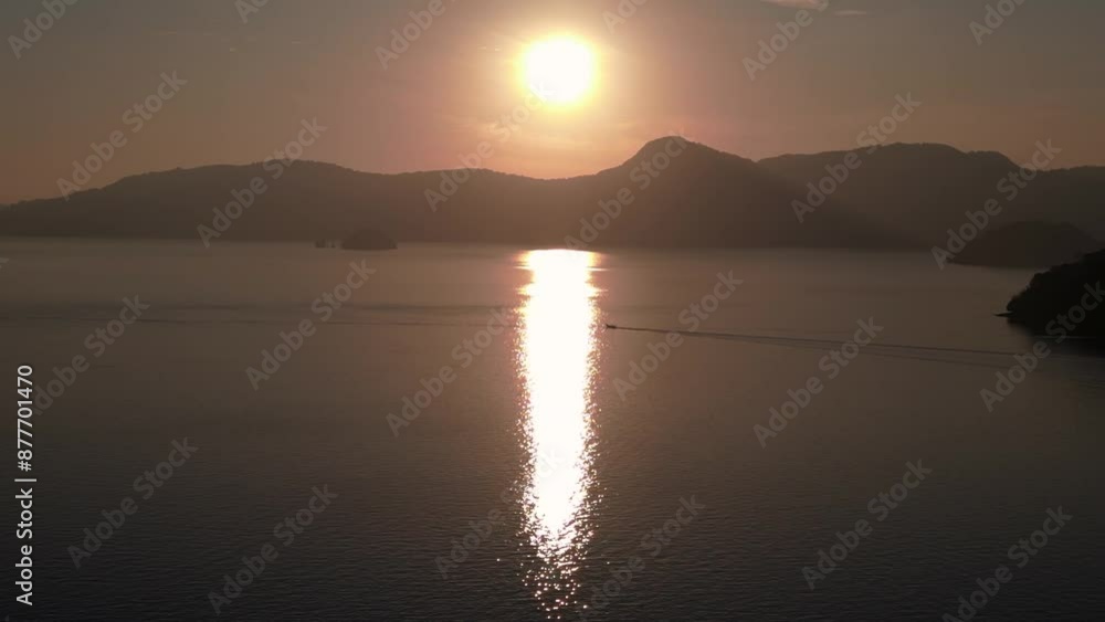 sun rays reflect in the ocean at sunrise. Marvelous aerial view flight drone sun rays reflect in the ocean at sunrise. Marvelous aerial view flight drone