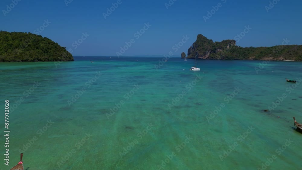 Catamaran sailing in turquoise water Phi island. Great aerial view flight drone Catamaran sailing in turquoise water Phi island. Great aerial view flight drone