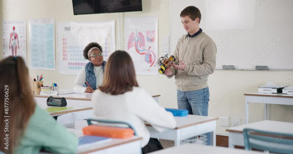 Boy, presentation and audience in classroom at high school with model electric car for innovation in transport. Student, teenager or person with teacher, writing and speech for eco friendly travel Boy, presentation and audience in classroom at high school with model electric car for innovation in transport. Student, teenager or person with teacher, writing and speech for eco friendly travel