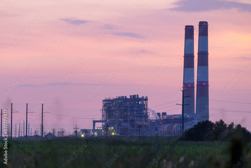 The Big Bend Power Station in Apollo Beach, a power plant managed by TECO (Tampa Electric Company) at sunset The Big Bend Power Station in Apollo Beach, a power plant managed by TECO (Tampa Electric Company) at sunset