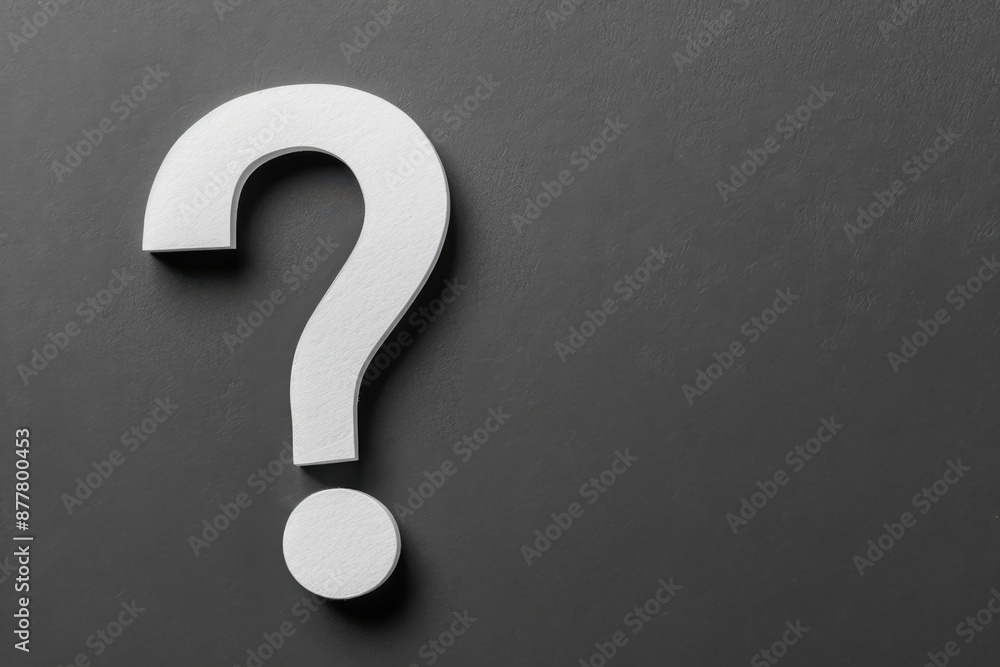 Close-up of a large white question mark on a plain dark background, symbolizing inquiry, curiosity, and uncertainty. Close-up of a large white question mark on a plain dark background, symbolizing inquiry, curiosity, and uncertainty.
