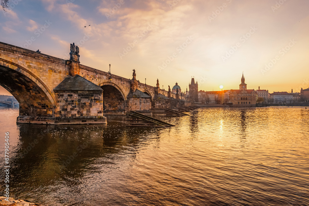 Fototapeta premium View of the city of Prague and the Vltava river with Old Town Bridge Tower on Charles bridge in Prague, Czech Republic.