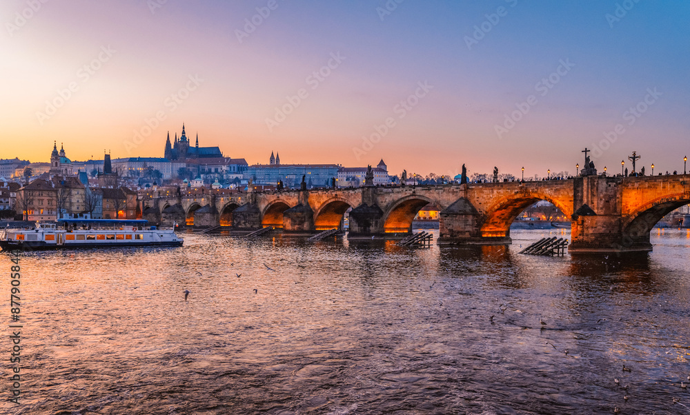 View of the city of Prague castle in hradcany and the Vltava river with Charles bridge in Prague, Czech Republic. View of the city of Prague castle in hradcany and the Vltava river with Charles bridge in Prague, Czech Republic.