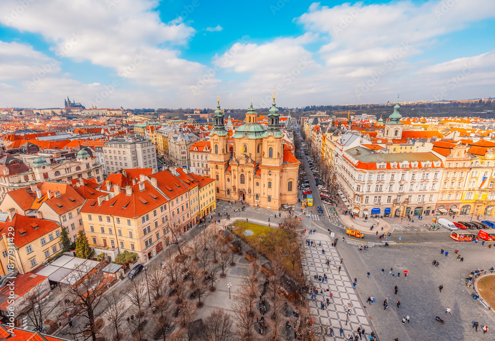 Obraz premium View of the city of Prague and old town square with buildings and Church of Our Lady before Tyn in the stare mesto from platform of Old Town Hall (Staromestska Radnice)