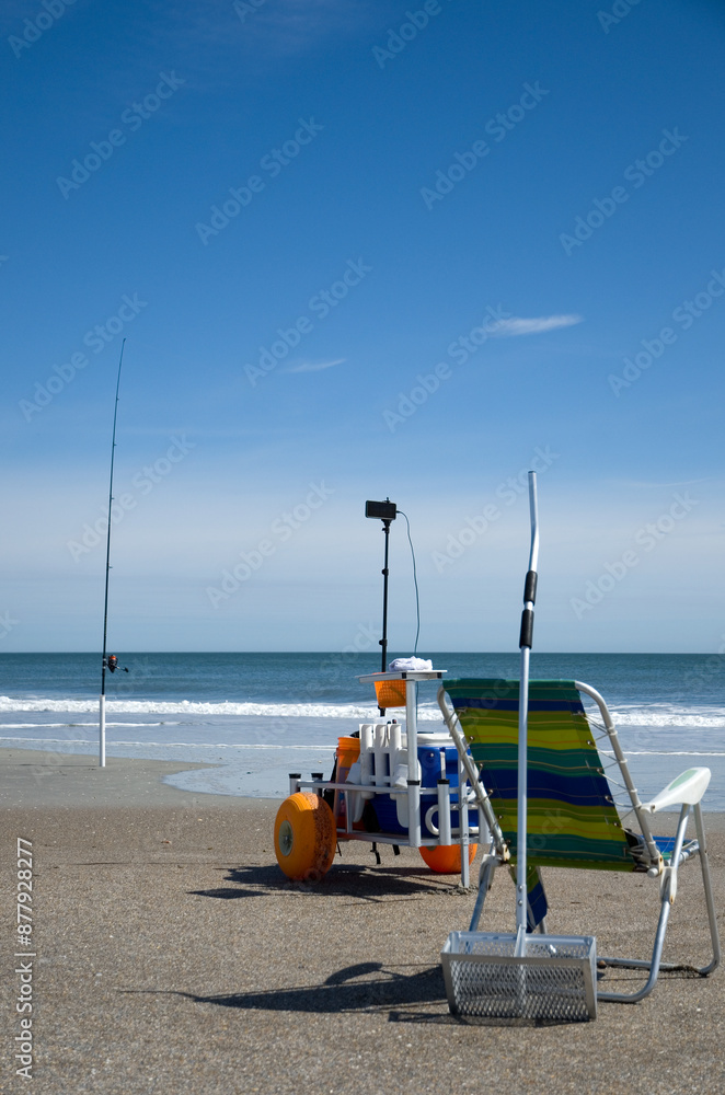 Fishing Rod, Chair and Trailer on Sunny Florida Beach