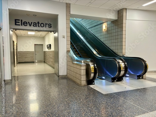 Elevators and two empty escalators at CVG Airport terminal. photo