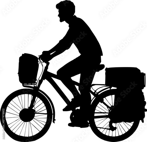 Silhouette of a majn riding a  bicycle, touring bicycle 