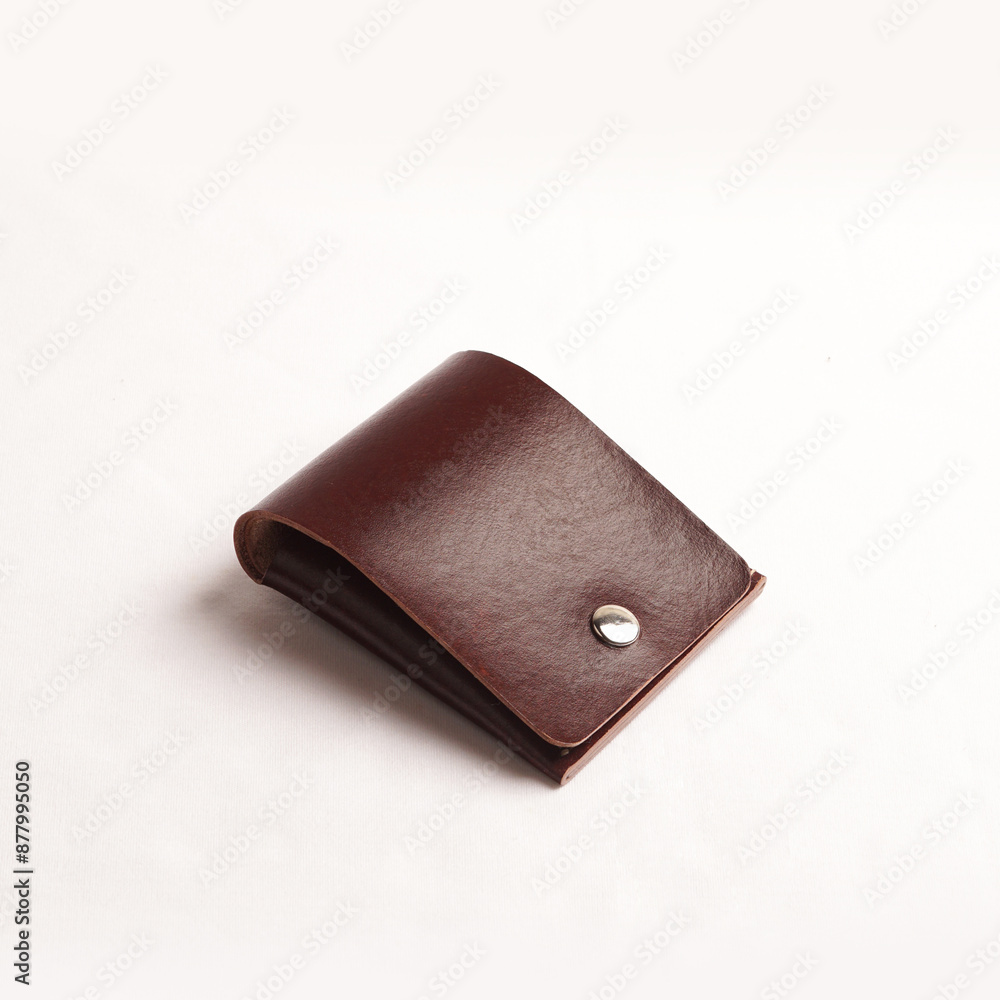 various leather wallets in various colors and cartoon cases with plain white backgrounds various leather wallets in various colors and cartoon cases with plain white backgrounds