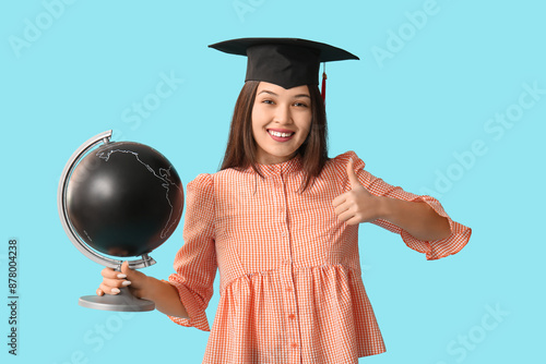 Young female graduate with ...