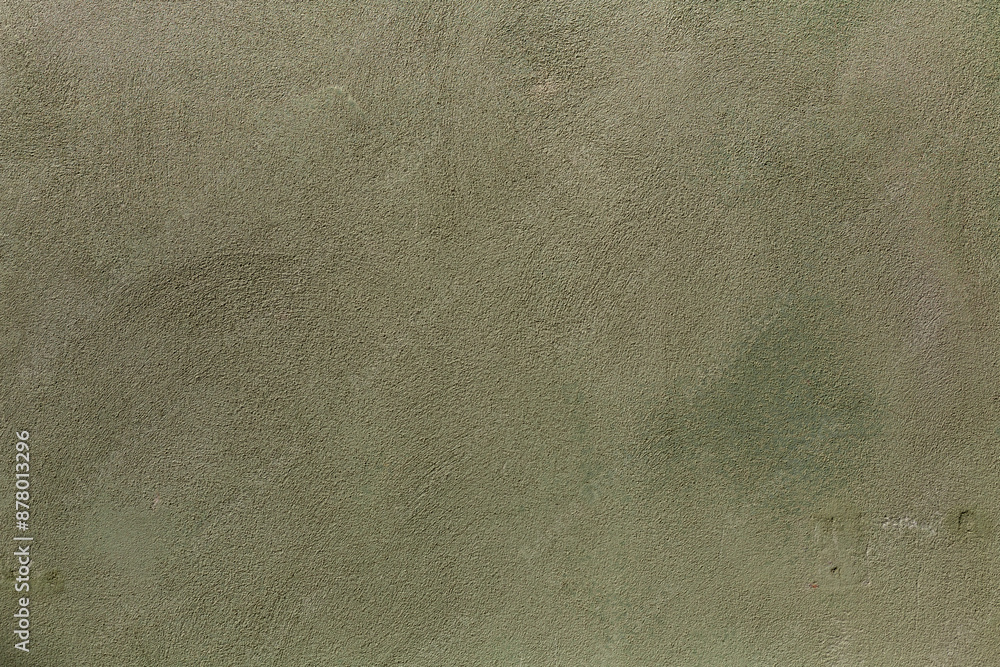 Naklejka premium Background texture of wall with old worn pale green stucco or cement