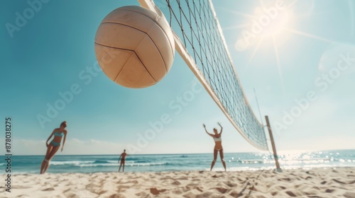 Wallpaper Mural Group of friends playing a lively game of beach volleyball, capturing the joy and energy of recreational sport under the bright sun Torontodigital.ca