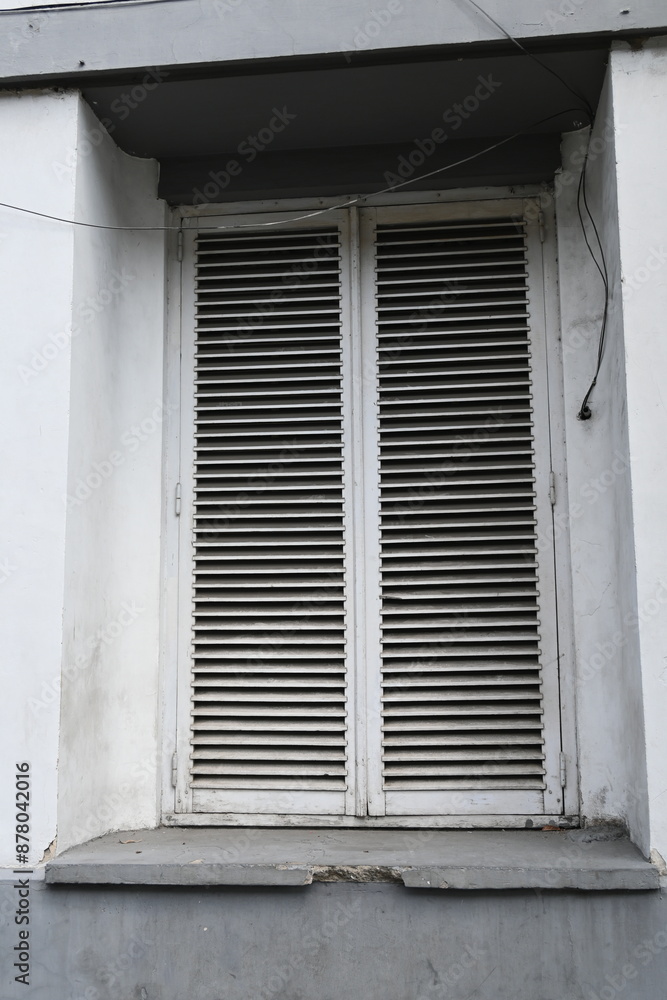 old window with shutters old window with shutters