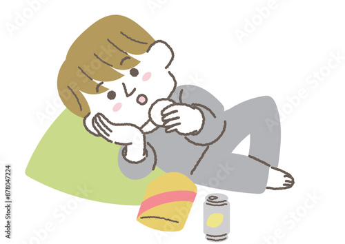 寝転がってお菓子を食べている男性のイラスト