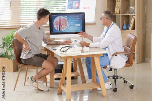 Mature urologist working wi...