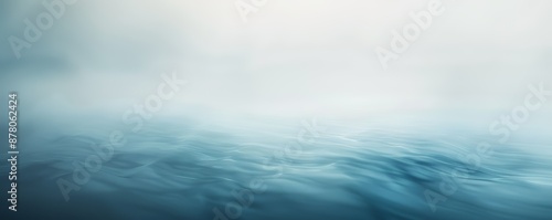 Tranquil Foggy Ocean with Gentle Waves and Abstract Light in Blue Tones