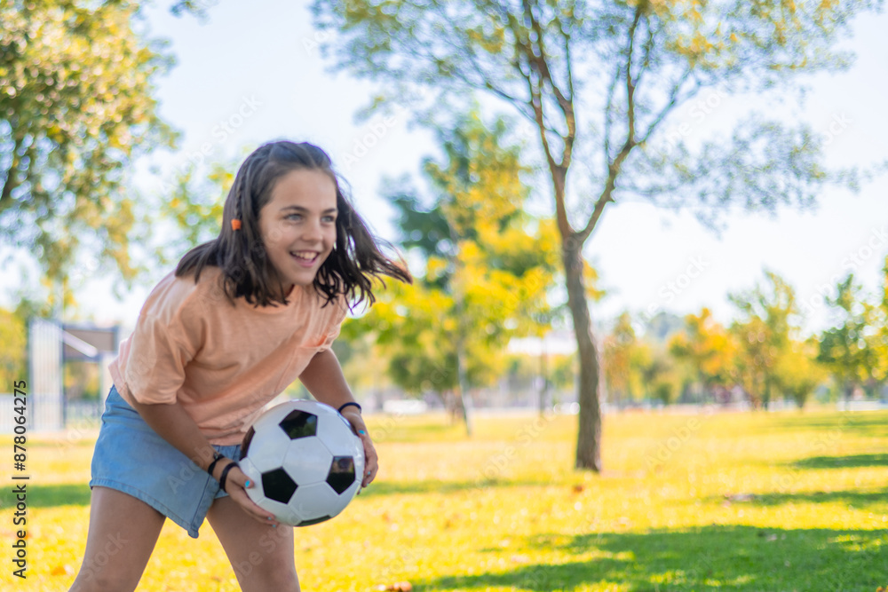 Girl Playing with Ball in a Park Outdoors Girl Playing with Ball in a Park Outdoors