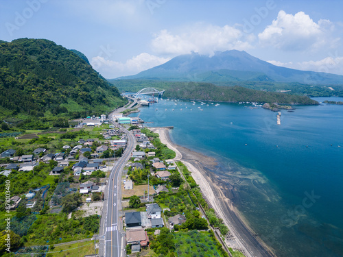 Obraz na płótnie Kagoshima, Japan: Aerial drone view of the coastal road between Kirishima and the Sakurajima volcano in Kagoshima prefecture in the Kyushu island in Japan. w salonie