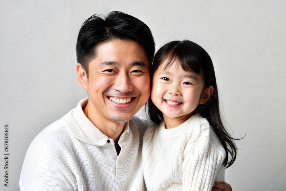 Happy Asian Father and Daughter Smiling Together
Happy Asian Father and Daughter Smiling Together