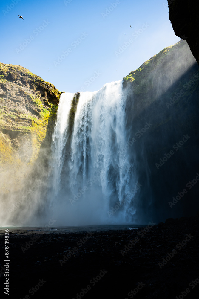 Stunning view of the Skógafoss Waterfall at sunset. Skógafoss is one of the biggest waterfalls in Iceland, situated on the Skoga River in the south of Iceland.
