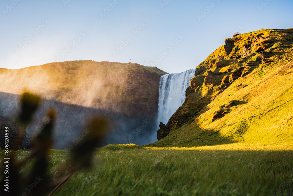 Stunning view of the Skógafoss Waterfall at sunset. Skógafoss is one of the biggest waterfalls in Iceland, situated on the Skoga River in the south of Iceland.