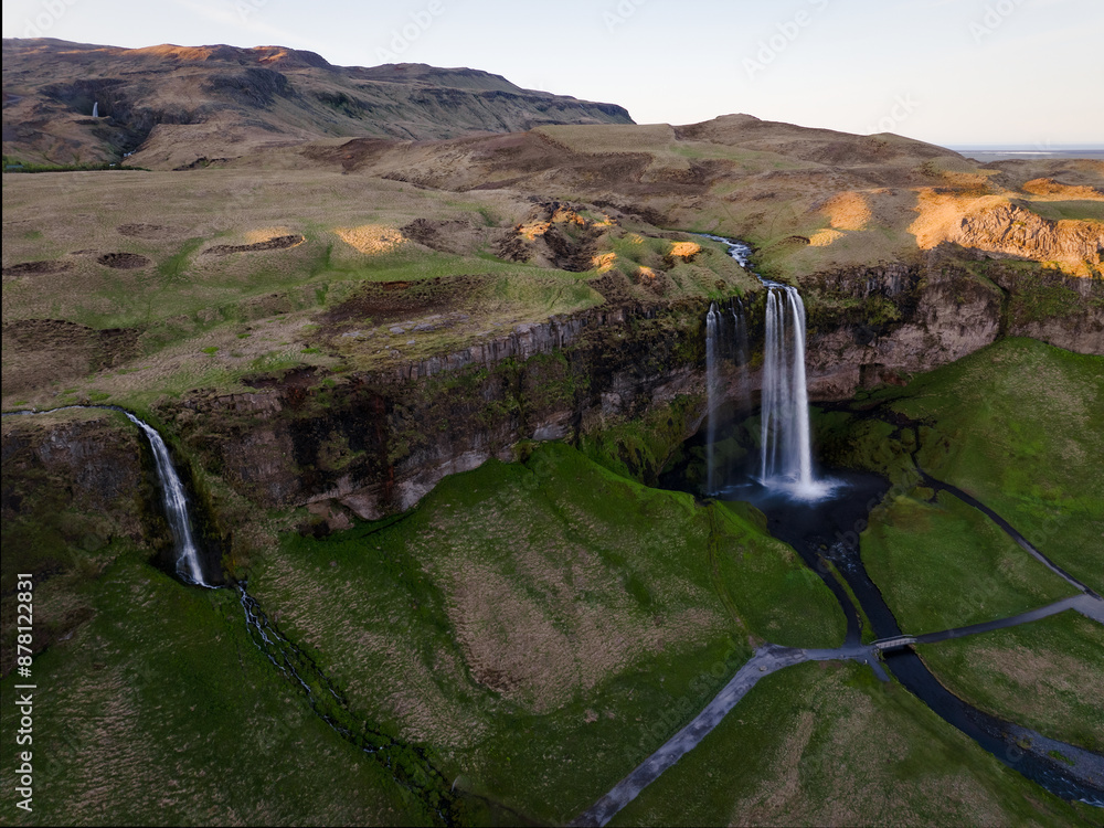 View from above, stunning aerial view of Seljalandsfoss waterfall at sunset. Seljalandsfoss is one of the most impressive waterfalls in the country. Iceland.