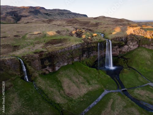 Obraz na płótnie View from above, stunning aerial view of Seljalandsfoss waterfall at sunset. Seljalandsfoss is one of the most impressive waterfalls in the country. Iceland. w salonie
