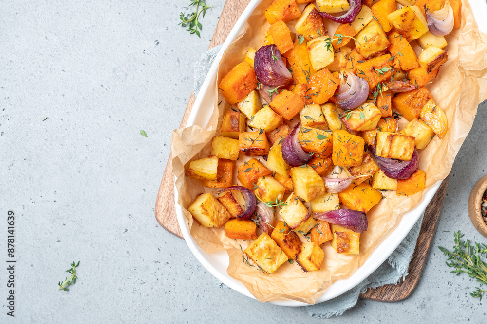 A white plate with a variety of vegetables including onions and potatoes A white plate with a variety of vegetables including onions and potatoes