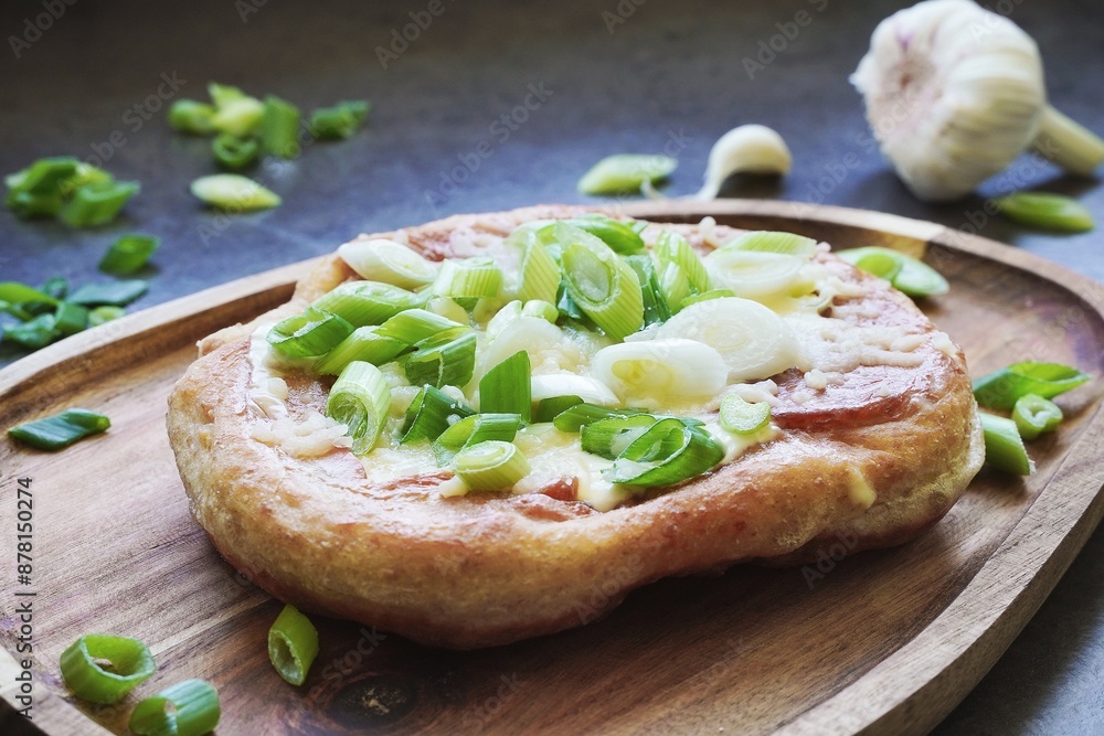 Fresh fried Lángos, traditional hungarian food Fresh fried Lángos, traditional hungarian food