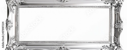 silver frame with elaborate engravings and ornate corners