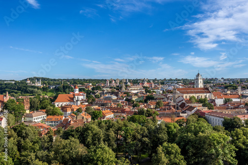 Beautiful view over a part of Vilnius in Lithuania surrounded by forest during a sunny day in summer.