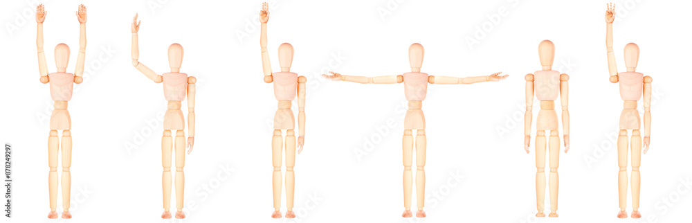Assortment of wooden mannequins in different stances, isolated on white backdrop